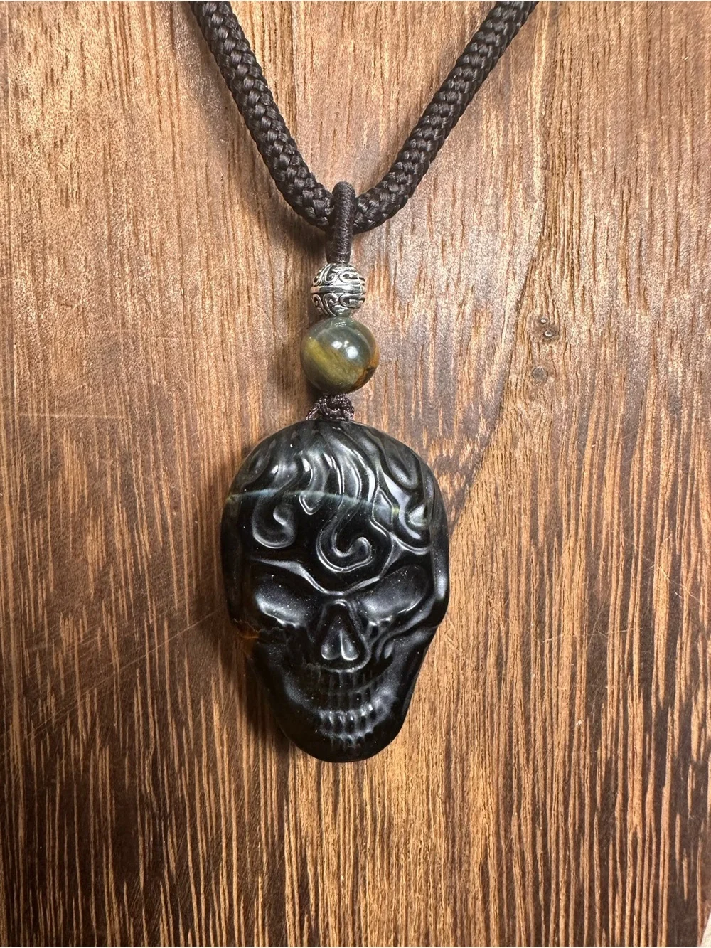 Unique Blue and Golden Tiger’s Eye Skull Carving Pendant Necklace on Brown